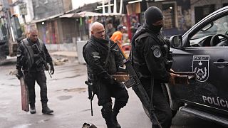 Rio police free hostages in raid that leaves eight dead