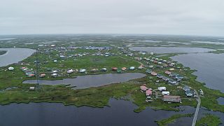 One dead and two missing as typhoon remnants devastate Alaska coast