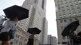 Heavy rain triggers flash floods and travel chaos on US East Coast