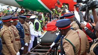Raila Odinga's body arrival at JKIA draws thousands of mourners