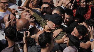 Palestinians welcome home prisoners freed under Israel exchange deal