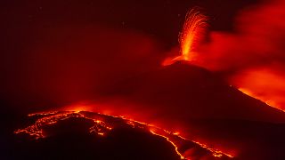 Mount Etna glows with lava as eruptions light the night sky