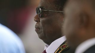 US imposes sanctions on Zimbabwe's president, first lady and 9 top officials