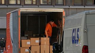 International postal services pause parcel post to US over tariff 'ambiguity'