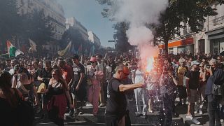 Clashes erupt in Paris as protesters rally against Macron government