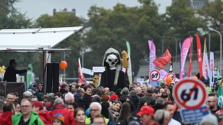 Tens of thousands join national strike in Belgium over welfare cuts
